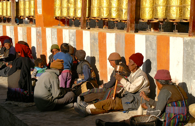  Lo Manthang, Upper Mustang, Nepal: This is the equivalent to the Italian evening passeggiata. People gather after work has finished to catch the sun, talk, and a little spinning…
